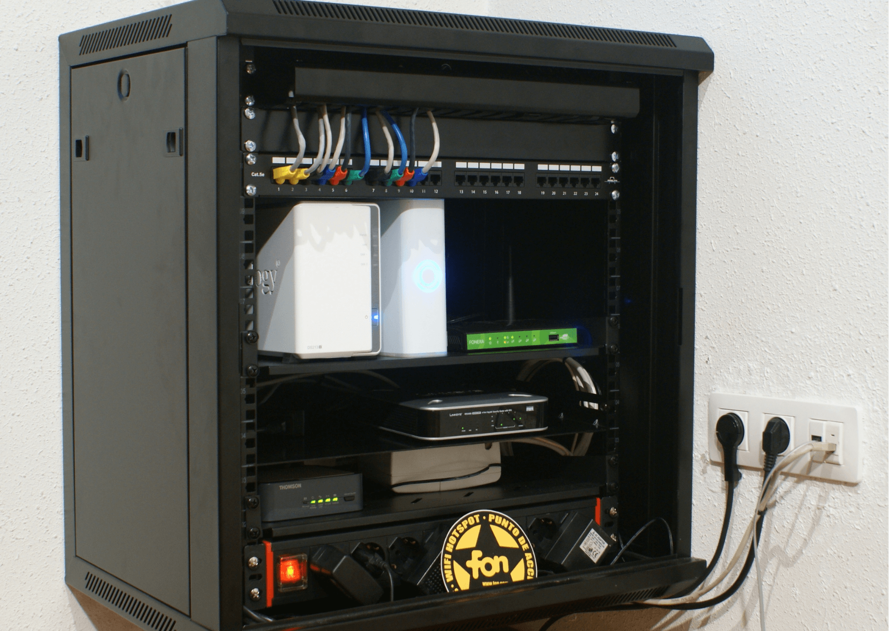 server rack cabinet full of devices